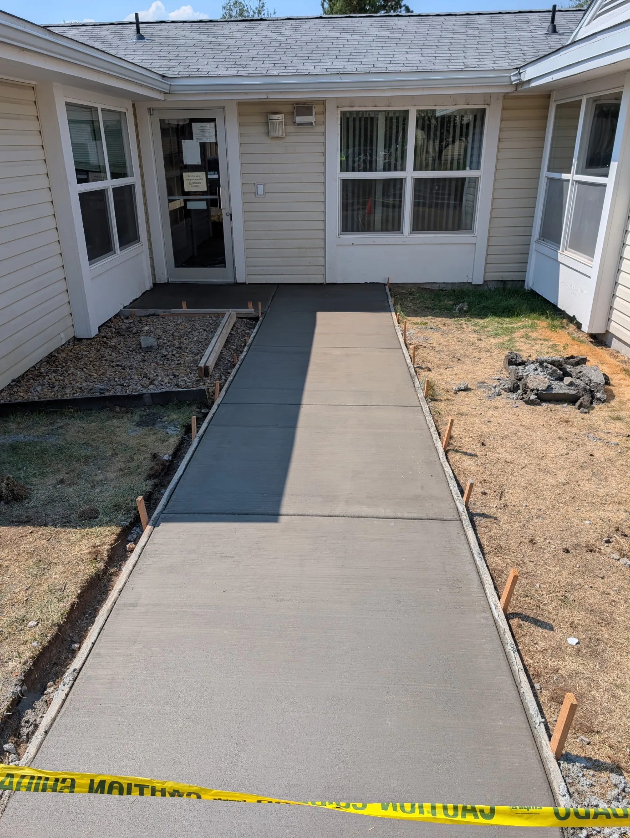Replacement walkway poured at a multi-building residential property
